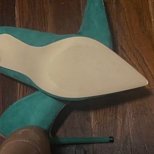 Green suede pumps